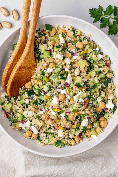 The Jennifer Aniston Salad is totally worth the hype! With fluffy quinoa, crisp veggies, fresh herbs, chickpeas, creamy feta and crunchy pistachios Quinoa And Feta Salad, Jennifer Aniston Quinoa Salad, Quinoa Feta Salad, Plant Based Whole 30, Chickpea And Quinoa, Pickle Salad, Jennifer Aniston Salad, Aniston Salad, Perfect Quinoa