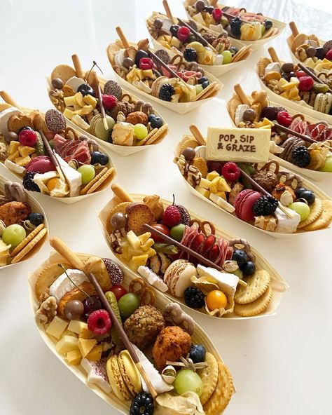 Pop, Sip & Graze on Instagram: “Show-stopping grazing boats to elevate your next event. Each boat is perfectly portioned for one. All of our designs are unique and we…” Unique Grazing Board, Food Cones, Grazing Platter Ideas, Grazing Platter, Lunch Catering, Charcuterie Inspiration, Charcuterie And Cheese Board, Boat Food, Charcuterie Recipes