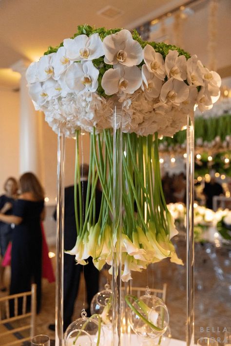 calla lillies
orchids
hydrangeas
modern
wedding
florals
centerpiece
unique florals Modern Wedding Flowers Arrangements, Calla Lillies Wedding, Tall Flower Centerpieces, Wedding Table Centerpieces Elegant, Orchid Centerpieces Wedding, White Hydrangea Centerpieces, Luxury Wedding Centerpieces, Elegant Table Centerpieces, Modern Wedding Centerpieces