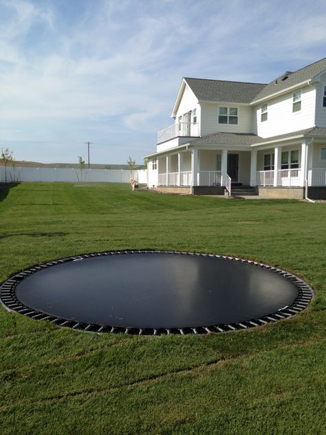 Our beautiful back yard and fence with underground trampoline! Finally our yard is in!!!! Built In Trampoline, Underground Trampoline, Trampoline Uneven Ground, Aesthetic Trampoline Park, Urban Air Trampoline Park, In Ground Trampoline, I’m Ground Trampoline, Apartment Office, Horse Rescue