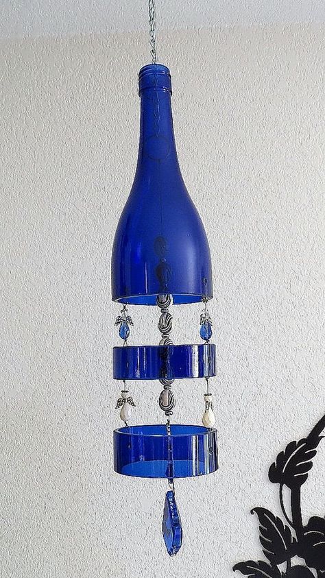 recycled-wine-bottle Wine Bottle Chimes, Bottle Chimes, Reuse Wine Bottles, Bottle Hanging, Wine Bottle Project, Box Decorations, Wine Bottle Wind Chimes, Bottle Centerpieces, Recycled Wine Bottles