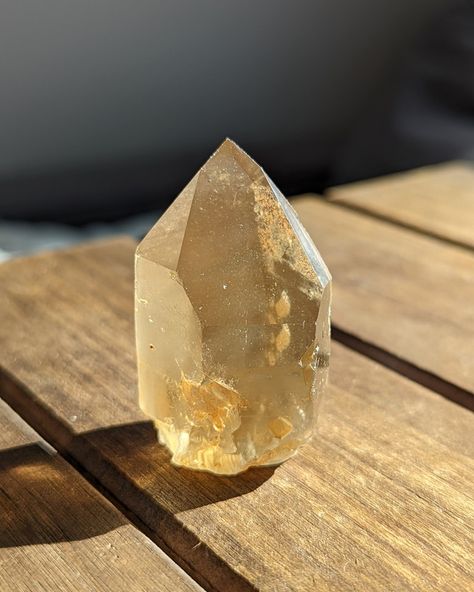 "Citrine, a variety of quartz, captivates with its warm, golden hues and remarkable properties. Known as the 'Merchant's Stone,' it is believed to attract prosperity and success. This crystal resonates with the solar plexus chakra, promoting confidence and personal power. Citrine is renowned for its ability to dissipate negative energy and invite abundance into one's life. From a mineral perspective, it shares the same chemical composition as amethyst, with the vibrant color resulting from th... Citrine Crystal Aesthetic, Crystals Citrine, The Solar Plexus Chakra, Radiant Energy, Crystal Aesthetic, Solar Plexus Chakra, Personal Power, Citrine Crystal, Solar Plexus