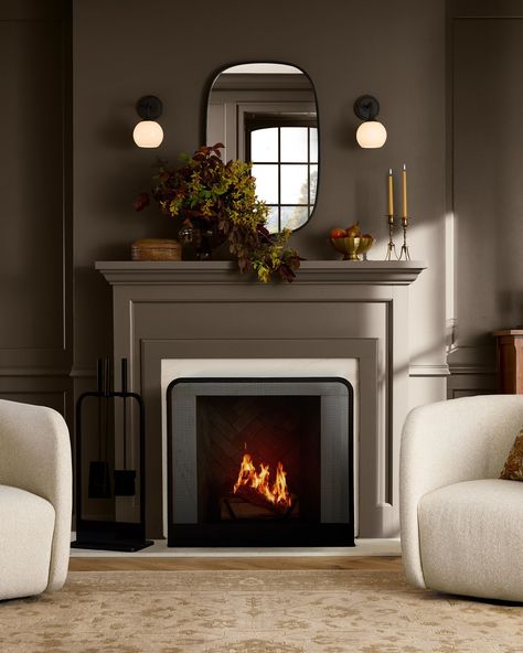 Make the fireside the focal point in your room with hearth accessories, soft lighting, and a decorative mirror. Fireplace With Sconces, Flat Fireplace, Above Fireplace Ideas, Above Fireplace Decor, Modern Fireplace Tools, Sconces Fireplace, Light And Dwell, Fireplace Lighting, Fireplace Tool Set