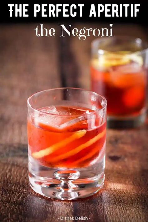 The Negroni recipe is a favorite among many people. It's a delightful mix of bitter and sweet which makes it a perfect aperitif. #negroni #aperitif #dishesdelish Negroni Cocktail Recipe, Vermouth Cocktail, Negroni Recipe, Negroni Cocktail, Kid Friendly Drinks, Homemade Soda, Sweet Cocktails, Colorful Cocktails, Refreshing Drinks Recipes