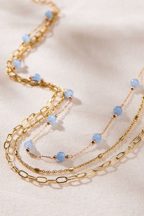 Dainty Blue and Gold Layered Necklace | Altar'd State | Altar'd State Bridgerton Party, Bling Things, Gold Layered Necklace, Gold Necklace Simple, Blue Beaded Necklace, Trending Necklaces, Clover Charm, Daily Jewelry, Gold Chain Jewelry