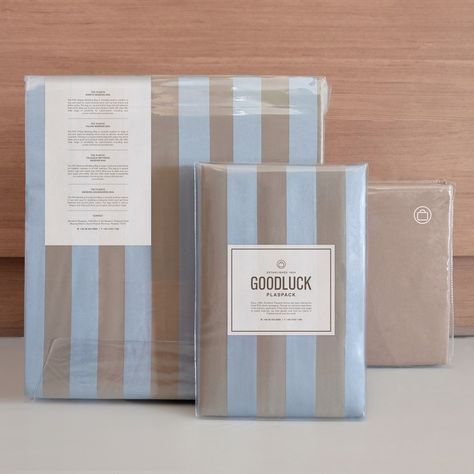 Bedsheet Packaging Ideas, Sheets Photoshoot, Bedsheet Packaging, Bedcover Packaging, Bedding Packaging, Cafe Packaging, Blue Linen Bedding, Sacred Threads, Pastel Room Decor