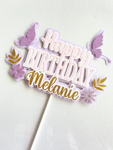 This custom happy birthday name cake topper is sure to impress your guests on your special day. Click to shop now!  Designed with the utmost detail specially made for you! Perfect to use to decorate cake, place in flower bouquet/fruit basket, or as a photo prop. You might also like this: https://www.etsy.com/ca/listing/1196892459/custom-name-cake-topper-birthday-cake?ref=shop_home_active_5&sca=1  Our cake toppers are created with 65lb high quality premium acid -free cardstocks & a food safe stick. Cake Toppers are cut with a professional cutting machine to ensure seamless clean edges. CUSTOMIZATION: This topper can be customized to fit your theme. > Name > Color > Image (If you'd like to replace the butterflies/flowers/leaves or remove entirely please let us know!) PRODUCTION TIME: 1-3 bus Topper Name, Cake Topper Flowers, Birthday Topper, Flower Cake Topper, Happy Birthday Topper, Cake Topper Ideas, Cake Topper Svg, Layered Cake Topper Cricut, Cake Toppers Birthday