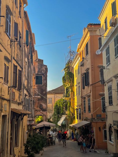 #favouriteplace #summer #summervibes #summertime #summeraesthetic #greece #greeceislands #greece🇬🇷 #greecelikealocal #corfu #islandlife #island #islandstyle #islandliving #aesthetic #sea #sealife #smalltown #smalltownromance #town #localadventurer #streetphotography #street #walks #summerwalker #sunset #sunnyyvibes #architecture Corfu Greece Aesthetic, Greek Town Aesthetic, Greece Streets, Greece Streets Aesthetic, Corfu Town, Small Town Romance, Greece Islands, Island Living, Thessaloniki