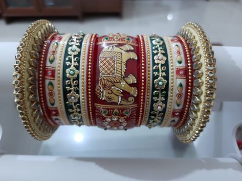 A bridal Rajwadi chuda with hand painted elephant and kundan work Rajwadi Jewellery, Bridal Bangles Wedding, Rajwadi Bangles, Punjabi Chura, Wedding Bangles, Bridal Jewelry Sets Brides, Bridal Jewellery Inspiration, Bridal Chura, Bride Jewelry Set