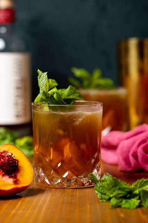 Brown Sugar Peach Mint Julep Mocktail | Orchids + Sweet Tea Brown Sugar Peaches, Mediterranean Appetizers, Thanksgiving Cocktail Recipes, Pitcher Cocktails, Summertime Cocktail, Creative Cocktails, Thanksgiving Drinks, Thanksgiving Cocktails, Pomegranate Molasses