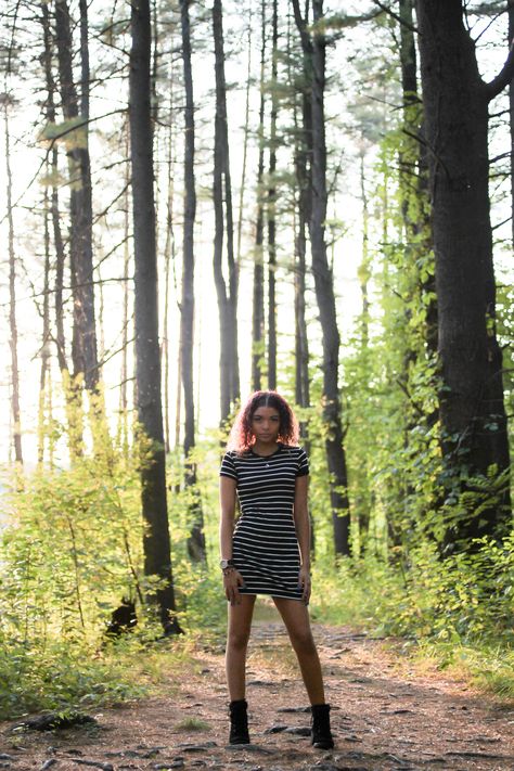 This is a good example of back light because you can see the sun shinning from behind the trees. Since the light is coming from behind, it lacks detail on the persons face but the trees in the background seem to pop out more. Light Coming From Behind Reference, Lighting From Behind Reference, Light From Behind Reference, Behind Reference, The Light Is Coming, Pose References, Back Light, Iconic Photos, Pop Out