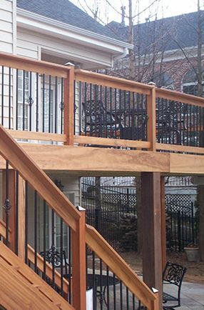 B Wise Contractors Wrought Iron Spindles Front Porch Railing Ideas Wrought Iron And Wood, Wrought Iron Deck Railing Ideas, Rod Iron Deck Railing Ideas, Wrought Iron Deck Railing, Deck Spindles Ideas Railings, Wood Porch Railings, Deck Styles, Iron Railings Outdoor, Wrought Iron Spindles