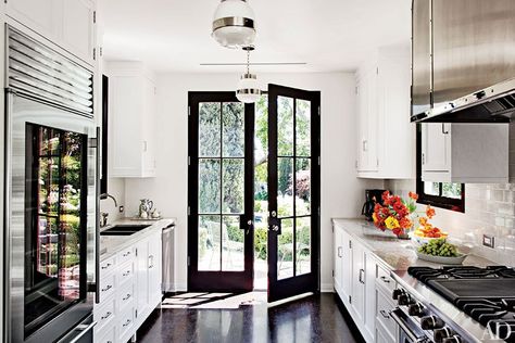 Top architects and designers share some of their expert strategies for successful renovations Black French Doors, Celebrity Kitchens, Hollywood Hills Homes, Nate Berkus, Classic Kitchen, Galley Kitchen, Style At Home, Beautiful Kitchens, Architectural Digest