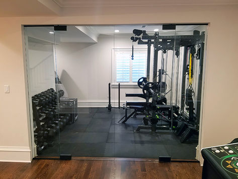 Glass Doors For Home Gym, Glass Wall Gym Design, Home Gym Partition Wall, Basement Gym Glass Walls, Gym With Glass Doors, Basement Gym Glass Door, Home Gym Glass Wall, Glass Door Gym, Home Gym With Glass Doors