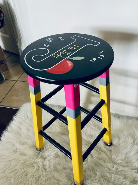 Painted Teacher Chair Classroom, Teacher Painted Chair, Painted Teacher Stool, Teacher Rocking Chair Painted, Teacher Stools, Classroom Stools, Teacher Chairs, Teaching Classroom Decor, Painted Stools