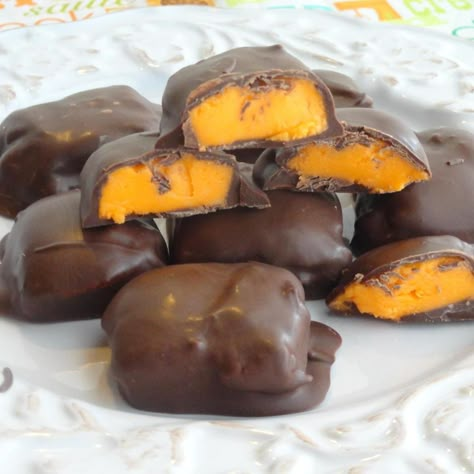 Sometime last winter, I found myself attempting to make a small batch of peppermint patties, and thought to myself "Well...If I just substitute the Flavoring, this could work for anything!" And thats what I did! and The Orange Creams were born! Adjusting the Oil/Extracts and food colorings, and the options are endless! I hope you enjoy :) __________________________________  Credit to the Picture goes too www.CoblentzChocolates.com Chocolates Recipe, Orange Chocolate, Orange Candy, Candy Truffles, Candy Recipes Homemade, Homemade Candy, Candy Fudge, Peppermint Patties, Homemade Candies