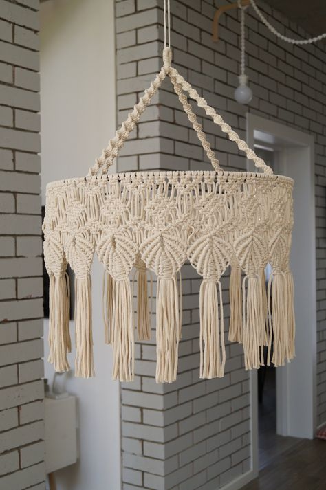 Macrame Lampshade,Fringe Chandelier Light,Round Lantern Lamp,Shell Ceiling Light,Bohemian Chandelier with tassels,Boho Housewarming Gift. Immerse into the world of Macrame Artistry and Ornate Elegance with our uniquely curated Macrame Lampshade Tassel Chandelier. A harmonious blend of Victorian charm and Bohemian flair, these customizable creations are handcrafted to illuminate your space with rustic sophistication. With selections from Beaded Lanterns to Fringe Ceiling Lights, our Top 10 collec Lamp Macrame, Macrame Lantern, Macrame Lampshade, Chandelier Boho, Fringe Chandelier, Macrame Light, Macrame Chandelier, Macrame Lamp, Boho Lighting