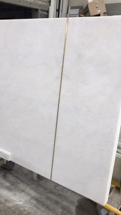 We love getting creative on oversized installs but seams always pose a challenge. Brass inlays are great example of ways to creatively mask… | Instagram Countertop Inlay, Marble Countertop Edges, Kitchen Island Countertop Seam, Brass Strip Countertop, Brass Seam In Countertop, Brass Inlay Countertop, Brass Inlay Cabinet Doors, Brass Inlay Tile, Counter Extension