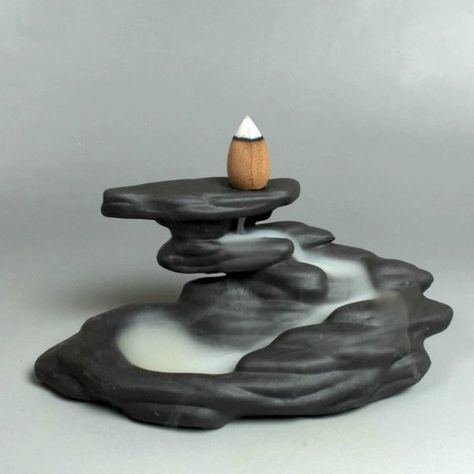 Japanese Ceramic Backflow Incense Burner- a moving, breathing work of art. Handcrafted with purple clay in a gorgeous, minimalist style.   Multi-functional and can be used for stick incense too.   Please check out our other listings for incense pairings- We currently stock Mysore Sandalwood Temple Backflow Incense scones among other rare, beautiful favorites.    #BeautyAdorned #BackflowIncenseBurner #BackflowIncenseHolder #BackflowIncense #BackflowIncenseBurner #Incense #IncenseCones #Etsy Waterfall Incense Burner, Backflow Burner, Waterfall Incense, Ceramic Incense Burner, Stick Incense, Mountain Waterfall, Incense Burner Holder, Sandalwood Incense, Sculpture Art Clay