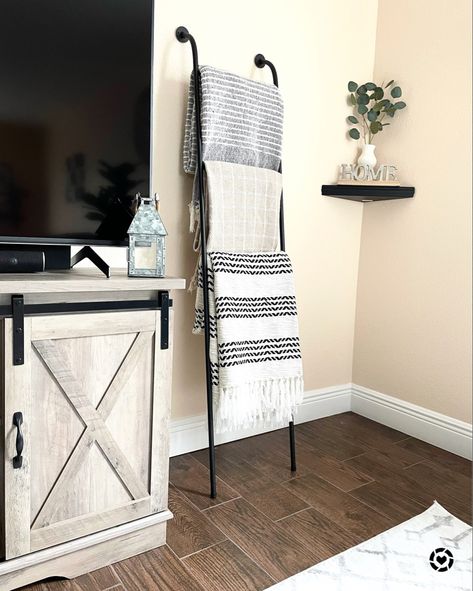 Decorative ladders are a great way to display and store your throw blankets in any space! Metal Blanket Ladder, Throw Blanket Ladder, Decorative Ladders, Ladder Display, Blanket Ladder, Papasan Chair, Cozy Throw Blanket, Industrial Farmhouse, Styling Accessories