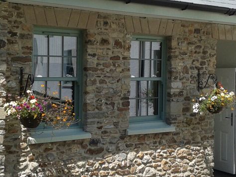 Cottage Chartwell Green sliding sash windows House Window Ideas, Door Colour Ideas, Victorian Farmhouse Decor, Rustic Craftsman Home, Scottish Croft, House With Wrap Around Porch, Upvc Sash Windows, Windows Upvc, September Garden