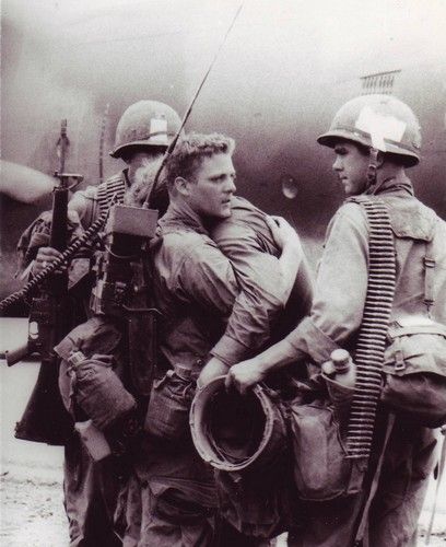 VN58 | A Radioman comforts his friend who had just survived … | Flickr Military Drawing, Military Reference, Vietnam Photos, Vietnam History, American Soldier, Gas Masks, Vietnam Vets, Rough Times, North Vietnam