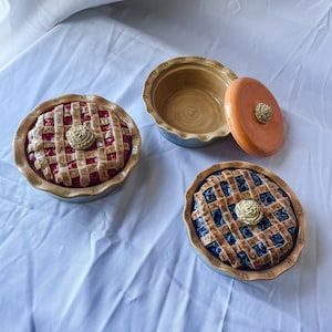 Ceramic Jar sculpted to look like a pie with a whipped cream handle Pie Ceramic, Pie Jars, Kitchen Ceramics, Cake And Dessert, Clay Jar, Thrift Inspo, Fake Cake, Dessert Shop, Fake Bake