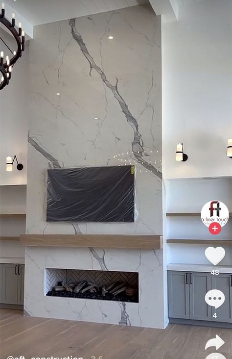 Fireplace Wall Ideas 2023, Fireplace Tile To Ceiling Ideas, Marble Corner Fireplace, White Marble Fireplace With Wood Mantel, Quartz Fireplace Wall With Tv, Stone Faced Fireplace, Tall Tile Fireplace Wall, Quartzite Fireplace Wall, 2 Story Linear Fireplace Ideas