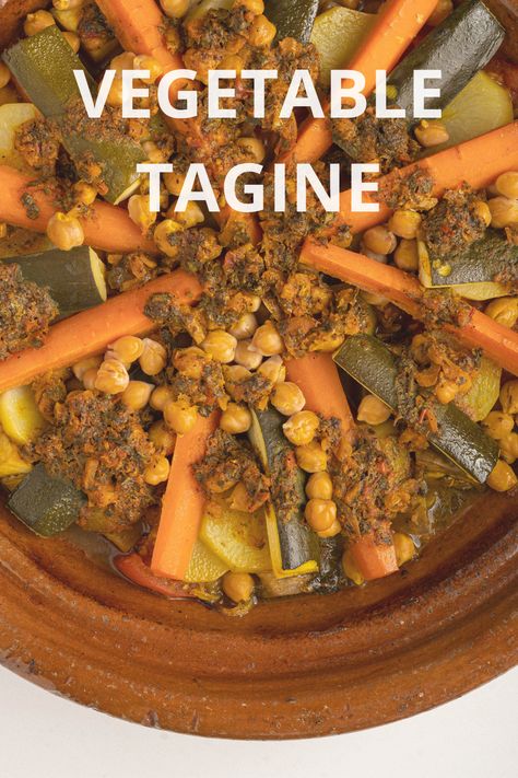 This Moroccan Vegetable Tagine is the perfect stew for the colder months, loaded with warm spices and hearty veggies. Served over a bed of couscous or with warm bread, this flavorful vegan meal is bound to warm up the entire family! Moroccan Vegetable Stew, Vegetable Tagine, Beef Tagine, Moroccan Seasoning, Tagine Cooking, Moroccan Vegetables, Vegetable Couscous, Tagine Recipes, Moroccan Dishes