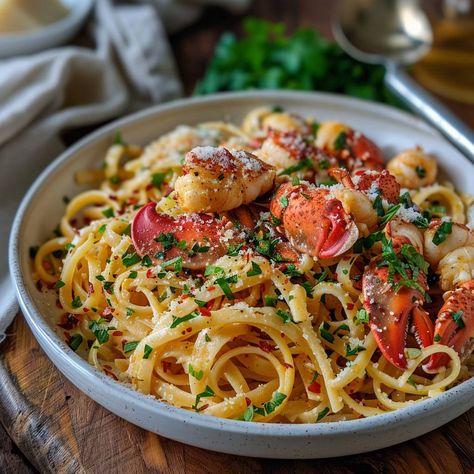 Lobster Linguine Ingredients: 500g linguine pasta 2 whole lobsters or 500g lobster meat (claws and tails) 4 tbsp unsalted butter 3 cloves garlic, minced 1 shallot, finely chopped 1/2 cup dry white wine 1 cup heavy cream Zest and juice of 1 lemon 1/2 cup grated Parmesan cheese Salt and pepper to taste 1/4 cup fresh parsley, chopped 1/4 tsp red pepper flakes (optional, for a bit of heat) #LobsterLinguine #SeafoodPasta #ItalianCuisine #GourmetPasta #HerbedFork #DeliciousDishes #EasyRecipes #Fan... Lobster Tagliatelle, Lobster Linguine, Prawn Linguine, Lobster Pasta, Gourmet Pasta, Linguine Recipes, Linguine Pasta, Lobster Meat, Shrimp Recipes Easy