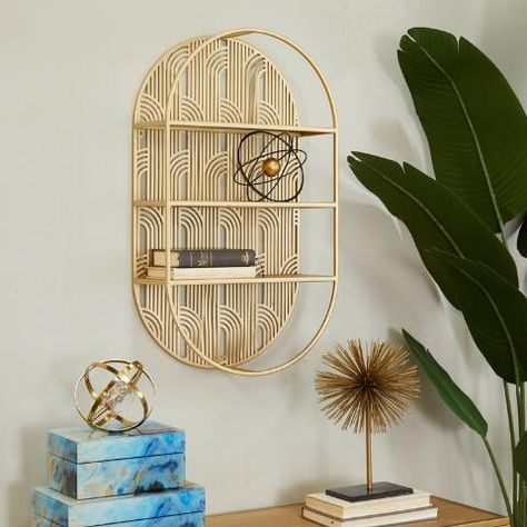 Oval Gold Art Deco Tier Wall Shelf | World Market Glam Interior Design, Metal Wall Shelf, An Organized Home, Cubby Shelf, Metal Wall Shelves, Cosmoliving By Cosmopolitan, Organized Home, Wall Shelf Decor, 3 Shelves