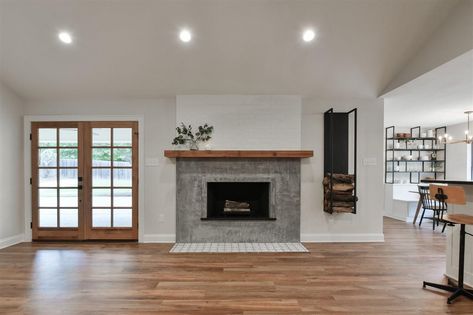 Chip And Joanna Gaines' First Flip Since 'Fixer Upper' Ended Has Officially Hit The MarketDelish Joanna Gaines Fireplace, Farmhouse Living Room Joanna Gaines, Fixer Upper Fireplace, Living Room Farmhouse Style, Living Room Joanna Gaines, Magnolia Market Joanna Gaines, Fixer Upper Living Room, Fixer Upper Joanna Gaines, Fixer Upper Kitchen