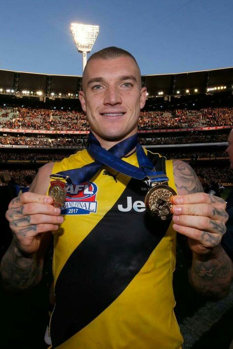 Dustin Martin with premiership medallion and Norm Smith Medal Richmond Afl, Dustin Martin, Richmond Football Club, Im Falling In Love, Sports Hero, Falling In Love Again, Heavy Metal Bands, Love Ya, Hottest Guy Ever