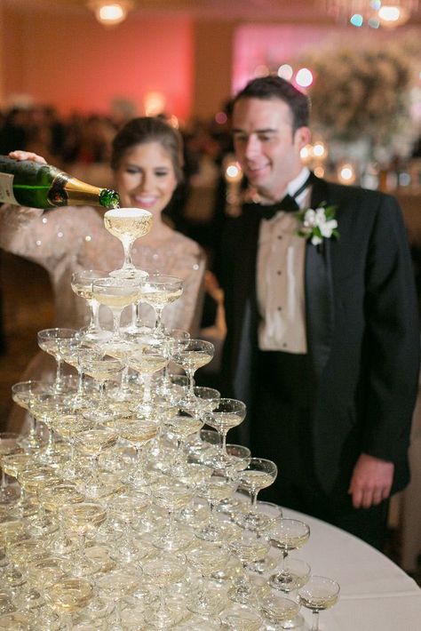 Champagne tower for cocktail hour at this classic New Orleans wedding at the Roosevelt Hotel on New Year's Even | nye wedding, winter wedding, nola wedding Best Wedding Toasts, Festival Themed Party, New Year's Eve Wedding, Wedding Toast, Nola Wedding, Roosevelt Hotel, New Years Wedding, Nye Wedding, Destination Wedding Locations