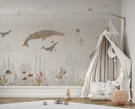 Enhance your kids bedroom with the enchanting sensational sea brown kids wallpaper. The playful depiction of sea creatures, including majestic whales, graceful stingrays, and vibrant coral formations, creates a dynamic and engaging atmosphere. Ideal for young explorers who are fascinated by the ocean, this wallpaper serves as a daily source of inspiration and joy. The soothing colors and intricate details bring a touch of nature indoors, making bedtime stories more vivid and exciting. Designed for easy installation and maintenance, this wallpaper ensures your child's room stays magical and inviting for years to come. Ocean Nursery, Murals For Kids, Brown Walls, Creative Labs, Ocean Themes, Shop The Look, Sealife, Boy's Room, Mural Wallpaper