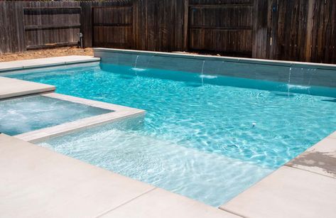 Small Pool With Tanning Ledge And Hot Tub, Pool With Sun Shelf And Spa, In Ground Pool With Tanning Ledge, Liner Pool With Hot Tub, Geometric Pool Designs With Spa And Tanning Ledge, Pool Landing Ideas, Simple Pool Water Feature, Gunite Pool Ideas With Tanning Ledge, Gunite Pool Tile Ideas