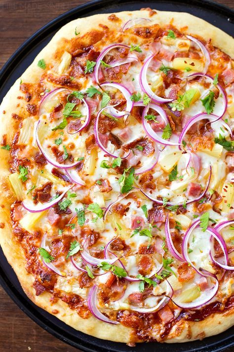 My favorite pizza crust topped with barbecue sauce, pineapple, ham, bacon and lots of cheese. This unique and flavorful Hawaiian-style bbq pizza is always a hit with our family! Ham And Pineapple Pizza, Pizza Life, Pizza Vegana, Pineapple Ham, Pizza Roll, Hawaiian Bbq, Bbq Pizza, Pineapple Pizza, Christmas Recipes Appetizers