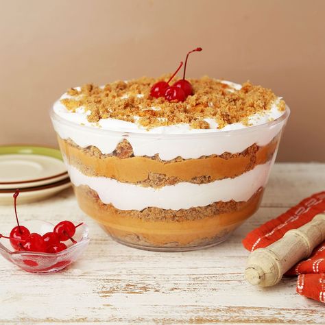 Transform leftover cake into a delightful pumpkin trifle layered with creamy butterscotch pumpkin, spiced cake crumbs and fluffy whipped cream. This easy dessert is perfect for any fall gathering. Pumpkin Roll Trifle Desserts, Pumpkin Trifle With Spice Cake, Pumpkin Pie Trifle, Thanksgiving Trifles, Pumpkin Trifle Desserts, Fall Trifle Recipes, Pumpkin Cheesecake Trifle, Thanksgiving Trifle, Chocolate Dirt Cake