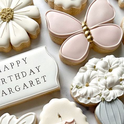 Jessica on Instagram: "🦋🎂🌸Do you recognize any of these designs?   My client reached out asking for a set of spring inspired birthday cookies and requested a few designs I had created from previous orders. They happened to be some of my very favorite designs, too, so I recreated them, but with a fresh, spring twist!  I rarely recreate designs from previous orders, verbatim. I will almost always tweak them in some way- whether it be the color, the shape or perhaps even just a different font; changes are necessary, as I believe each set calls for its own unique details to make it cohesive, uniformed and truly customized for each client. It’s all in the details!  Cutter shops tagged in comments🫶🏻 . . . . . . . . . #cookieart #royalicing #birthdaycookies #royalicingcookies #icingcookies # 90th Birthday Cookies, Fifty And Fabulous Cookies, Birthday Cookies Decorated Woman, Purple Birthday Cookies Decorated, Happy Birthday Cookies Decorated Women, Custom Birthday Cookies Women, Spring Twists, Purple Birthday, Flower Cookies