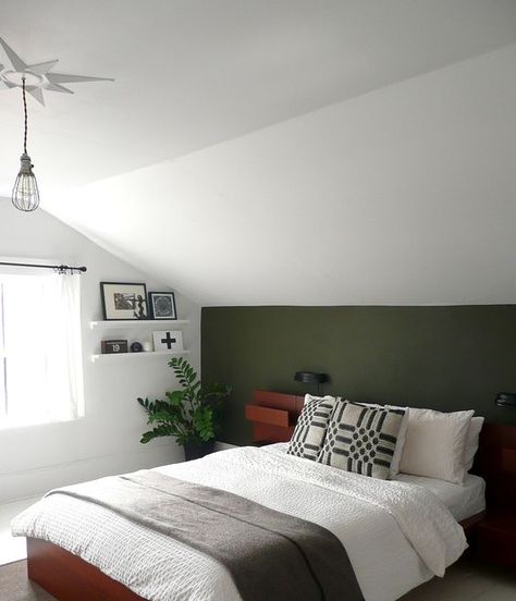 Army green paint color adds a touch of spunk to this room, I love it! Sloped Bedroom Ideas, Sloped Ceiling Bedroom Master Suite Slanted Walls, Sloped Bedroom Ceiling, Attic Paint Ideas Sloped Ceiling, Green Attic Bedroom, Army Green Bedroom, Attic Bedroom Designs Angled Ceilings, Army Green Paint, Bedroom Sloped Ceiling