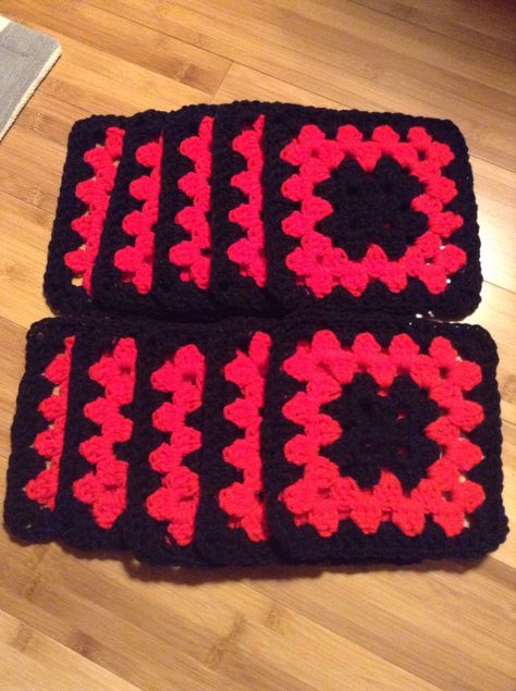 Working on a large granny square rainbow blanket - got all the red done, now on to the orange! (And the store, to buy more black yarn!) Red And Black Granny Square Blanket, Black And Red Granny Square, Red Granny Square, Red Blanket, Rainbow Blanket, Red Yarn, Granny Square Blanket, Black Crochet, What To Make