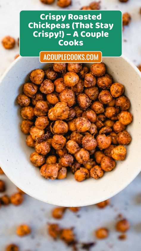 This crispy roasted chickpeas recipe is the perfect salty, crunchy healthy snack! They're spiced with chili powder and cumin. Healthy Crunchy Salty Snacks, Crispy Chickpea Snack, Crunchy Chickpeas Air Fryer, Salty Snack Recipes, Crunchy Chickpeas Oven, Spicy Crunchy Chickpeas, Chickpea Recipes Roasted, Crunchy Chickpeas, Couple Cooking