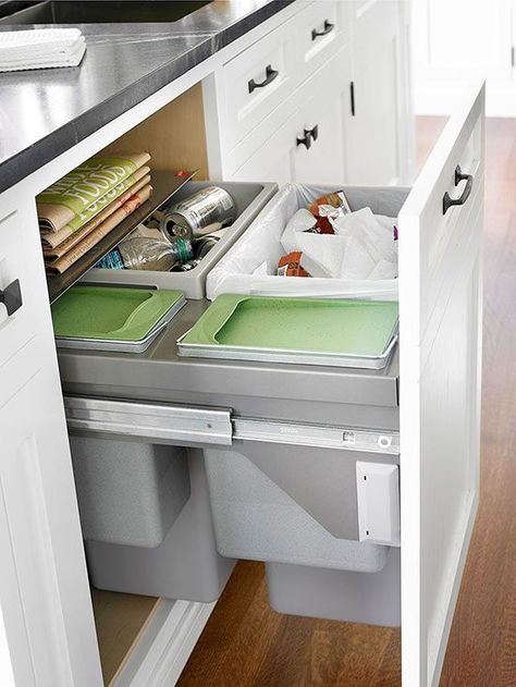 In this 1920s bungalow, space for recycling bins was simply not available. After a kitchen makeover, this compact trash center gets the job done. A false-front door/drawer conceals four compartments that easily slide out from under the counter. 1920s Bungalow, Kitchen Farmhouse, Kitchen Upgrades, Kitchen Cabinet Organization, Kitchen Cabinet Storage, Kitchen Drawers, Trash Bins, Recycle Trash, Modern Country