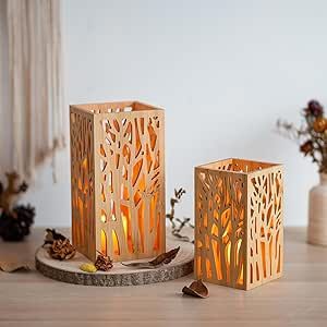 Want to add some unique flair to your living room or garden? The Romadedi Pillar Candle Holder Bamboo Japanese Decor is just what you need! This set of 2 hurricane lantern-style wood candle holders is perfect for a boho, cabin, or farmhouse aesthetic. They make an elegant table centerpiece or a charming addition to any space.#LivingRoomIdeas #MinimalistLivingRoom #BohoLivingRoomDecor Boho Cabin, Elegant Table Centerpieces, Japanese Candles, Cabin Farmhouse, Living Room Garden, Lantern Candle Decor, Pillar Candle Holder, Room Garden, Japanese Decor