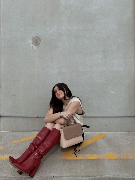 Girl in red boots for photo and outfit inspiration Red Boots Fall 2023, Red Fall 2023 Fashion, Red Boots Outfit 2023, Red Leather Boots Aesthetic, Cherry Red Boots Fall, Dark Red Knee High Boots, Red Boots Vintage, Red Heeled Boots Outfit, Red Leather Knee High Boots