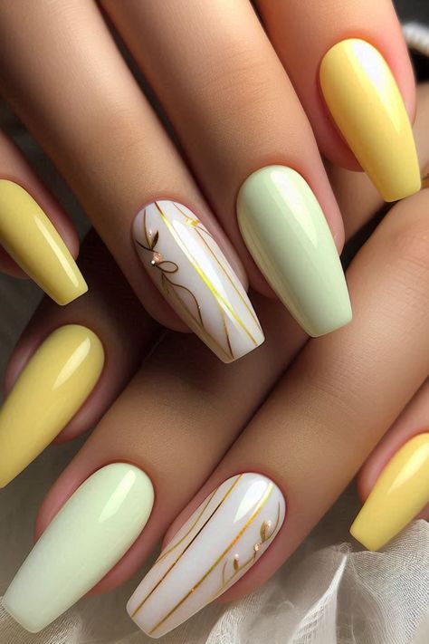 Discover the elegance of our pastel yellow, green, and white nail art, beautifully adorned with delicate gold accents. Perfect for adding a touch of glamour to your summer look! 💅💚✨ #NailArt #PastelNails #SummerStyle Pastel Yellow And Green Nails, Green And White Nail Art, Easy Summer Nails, Nail Parlour, Bday Nails, Usa Nails, Simple Spring Nails, Yellow Nails Design, Fancy Nails Designs