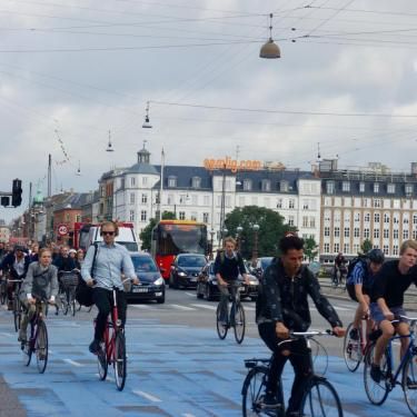 What makes Copenhagen the world’s most bicycle friendly capital? | VisitCopenhagen Bicycle Friendly Cities, Cycling Trips, Bike Lane, Best City, Street Bikes, Bucket Lists, Best Cities, Bike Ride, Amazing Places