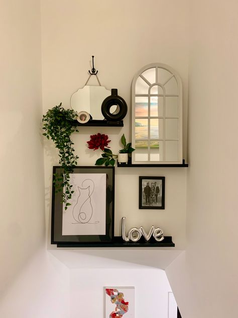 Picture Wall Under Stairs, Shelves Above Stairs, Stairway Ledge Decor, Decor Above Stairs, Top Of Landing Decor Ideas, Above Stairs Decor Wall, Over The Stairs Wall Decor, Black Picture Frames Stairs, Over Stairs Decor