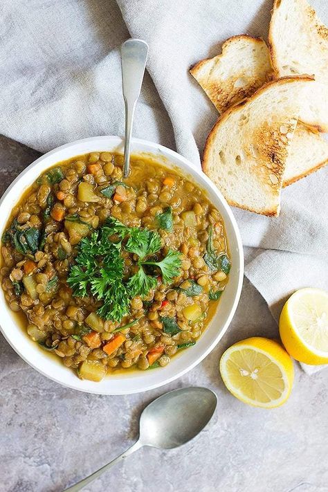 This green lentil soup is great for weeknight dinners. Finally, a lentil soup recipe that's jam-packed with Mediterranean flavors! #lentilsoup #vegetarianrecipes #lentilrecipes #vegetariansoup Instapot Soup Recipes, Green Lentil Recipes, Chicken Lentil Soup, Green Lentil Soup, Slow Cooker Lentil Soup, Green Lentil, Curried Lentil Soup, Hearty Soup Recipes, Slow Cooker Lentils