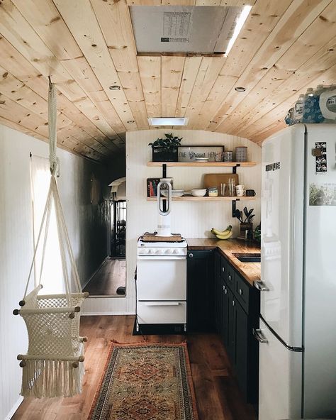 Skoolie Flooring Ideas, Converted Train Car Tiny House, 70s Retro Camper Interior, Skoolie Decor Ideas, School Bus Kitchen, Skoolie Organization, Skoolie Door, Skoolie Kitchen, Skoolie Conversion